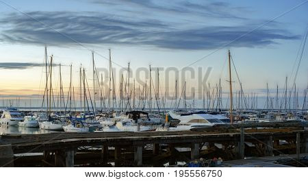 Yarmouth harbour on the Isle of Wight at sunset on a warm evening