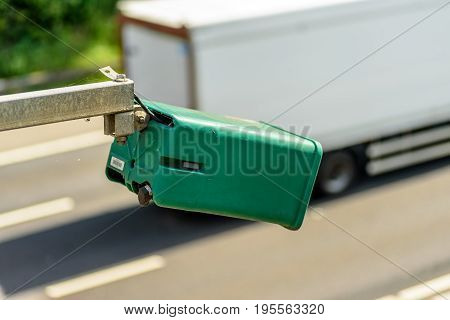 Day view of average speed traffic camera over UK Motorway.