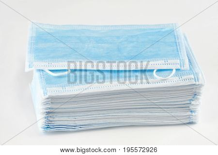 stack medical ear-loop mask isolated on white background