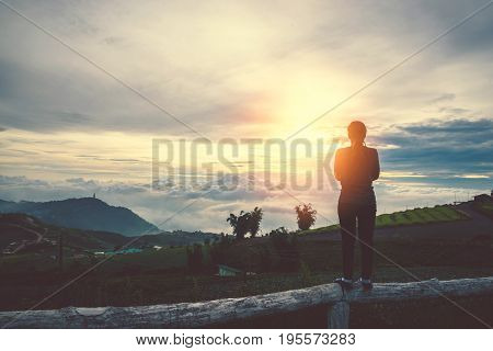 Asian women travel sleep relax. Morning atmosphere nature Forests mountains. Phu Thap Buek Thailand