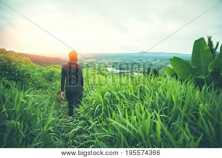 Asian women travel sleep relax. Morning atmosphere nature Forests mountains. khaoko Thailand