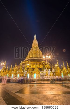 Shwedagon pagoda the iconic landmark of Yangon township of Myanmar at night.