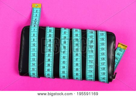 Money Saving And Fashionable Items Concept With Black Leather Wallet