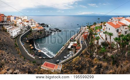 Panoramic aerial view of Chica beach in Puerto de Santiago in Los Gigantes Tenerife Canary Islands Spain.