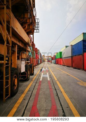 Close Up Wheel Rubber Tried Gantry Cranes (RTG) At Industrial Port