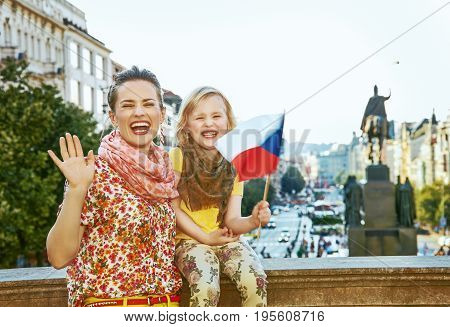 Mother And Child Travellers With Czech Flag Handwaving