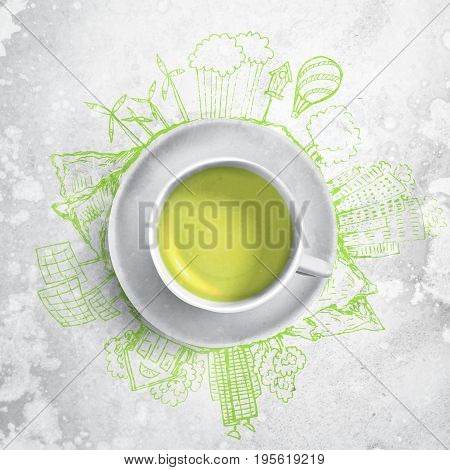 Green tea with ecology doodles. Sketched eco elements with cup of green tea. Textured background