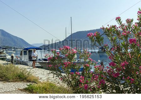 NYDRI, LEFKADA, GREECE -  JULY 17, 2014: Boats at Port of Nydri Bay, Lefkada, Ionian Islands, Greece