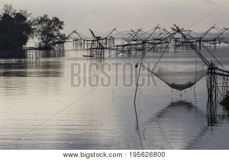 Landscape of Sunrise at Pak Pra lake Fishing had become a major means of survival as well as a business venture Pattalung Thailand.