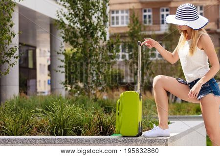 Attractive Woman Tourist With Suitcase Ready To Travel