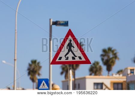 Traffic sign pedestrian crossing. Warning traffic sign.