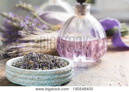 Nature cosmetics handmade preparation of essential oils perfume creams soaps from fresh and dried lavender flowers French artisanal boutique home style