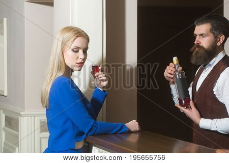 Woman And Bartender At Bar