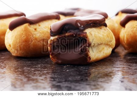 Traditional French Dessert. Eclair With Chocolate Icing. Pastery Concept