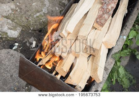 chopped wood in mangal. Ready for fire.