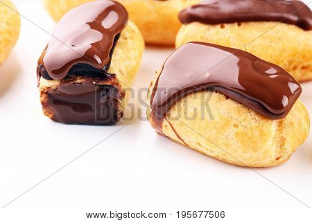 Traditional French Dessert. Eclair With Chocolate Icing. Pastery Concept