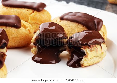 Traditional French Dessert. Eclair With Chocolate Icing. Pastery Concept