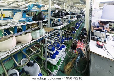 The Conveyor Of The Shoe Factory