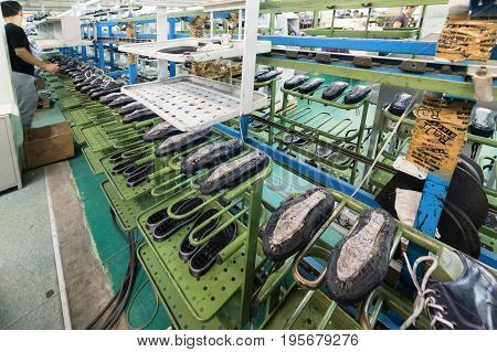 MOSCOW, RUSSIA - FEBRUARY 21, 2017: Moscow shoe factory JSC RALF RINGER. The conveyor of the shoe factory