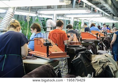 MOSCOW, RUSSIA - FEBRUARY 21, 2017: Moscow shoe factory JSC RALF RINGER. Shop processing of leather blanks.