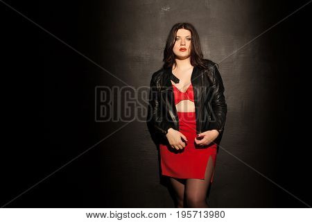 fat woman in red underwear in black room 1