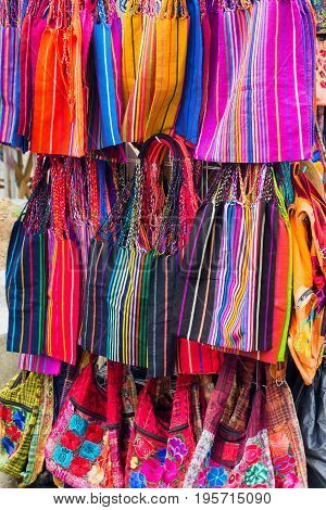 Colorful traditional bags for sale in a market in Oaxaca Mexico