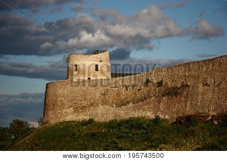 Wall and part of a tower of a fortress in Izborsk. All is made of limestone.