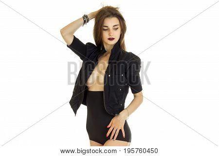 adorable brunette with in black jacket and panties with big silicon breasts isolated on white background