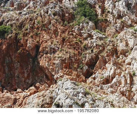 Sea landscape with high unapproachable rock 