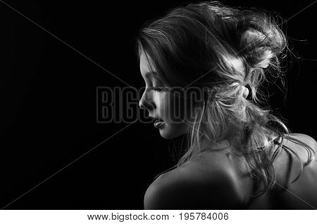Girl in lingerie in front of a white door