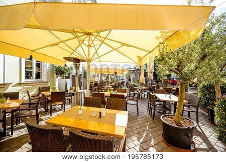 Morning view on the Wenige Square with cafe terrace in Erfurt city, Germany