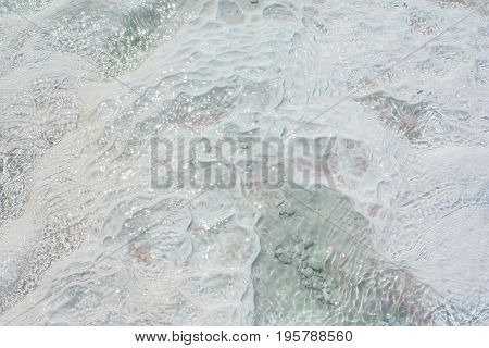 Close up river water saturated with calcium and salts in Pamukkale