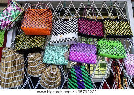 Keningau,Sabah,Malaysia-June 29,2017:Variety of handcrafts for sale in market at Keningau,Sabah.Sabah has many arts & crafts markets where can buy anything from soft wood carvings to batik fabrics.