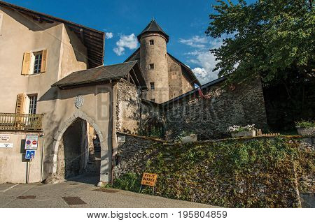 Conflans, France - June 29, 2016. Entrance of the medieval village of Conflans near the town of Albertville. Mountains landscape and blue sky on background. France