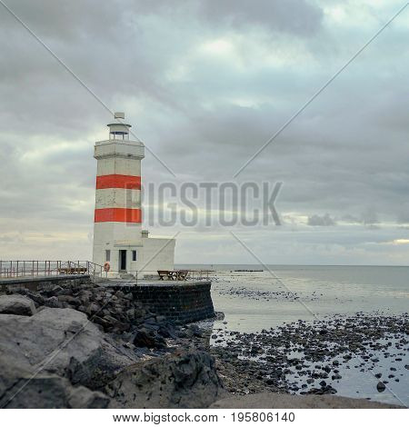 White Lighthouse In Gardur Iin Iceland