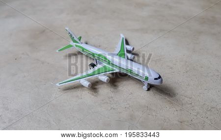 White platoon plane on cement floor, plane.