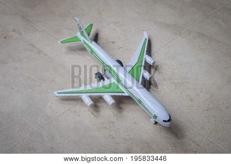 White platoon plane on cement floor, plane