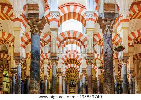 CORDOBA SPAIN - September 29 2016: Interior view of La Mezquita Cathedral in Cordoba Spain. Cathedral built inside of the former Great Mosque.