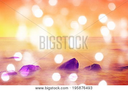 Film Effect. Romantic Morning At Sea. Big Boulders Sticking Out From Smooth Wavy Sea. Pink Horozon W
