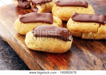 Traditional French Dessert. Eclair With Chocolate Icing. Pastery Concept