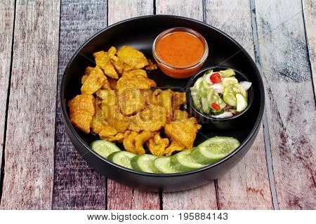 Charcoal Boiled ,pork Satay Served With Side Disk.
