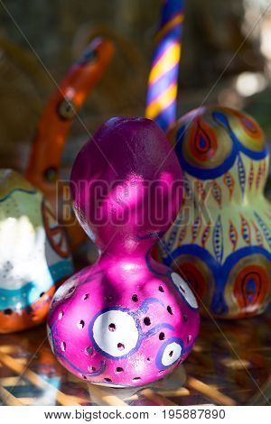 Paint on pumpkin shells: Antalya, Turkey - June 25, 2017. Paint on pumpkin shells - interesting element of interior design - lamps and shades, covered with patterns and pictures