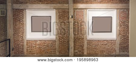 interior design wall with frame to shw texture on brick wall minimal abstract background lowkey lighting.