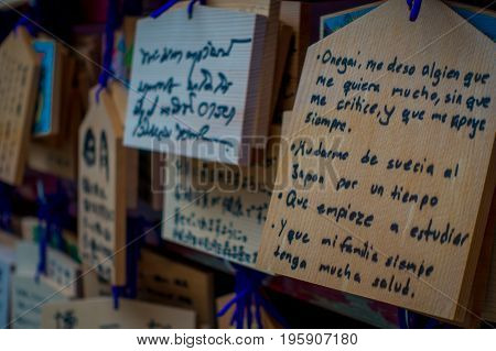HAKONE, JAPAN - JULY 02, 2017: EMA at Kiyomizu-dera Temple. EMA are small wooden plaques on which Shinto worshippers write their prayers or wishes.