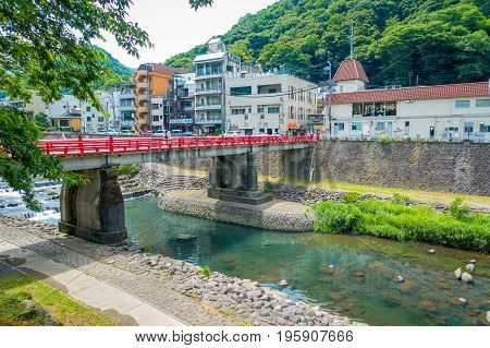 HAKONE, JAPAN - JULY 02, 2017: Red bridge over the river at Odawara, transition point to Hakone.