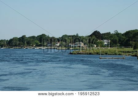 Barrington Rhode Island USA - July 24 2005: Warren River shoreline from East Bay Bike Path