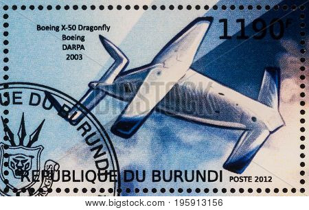 Moscow Russia - July 17 2017: A stamp printed in Burundi shows experimental unmanned aerial vehicle Boeing X-50 Dragonfly (2003) series 