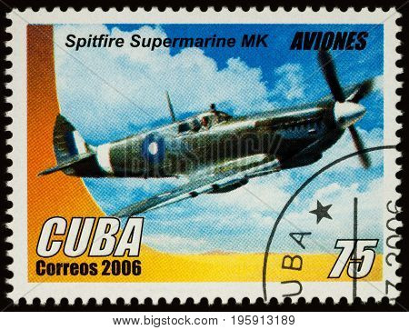 Moscow Russia - July 17 2017: A stamp printed in Cuba shows old British single-seat fighter aircraft of World War II - Spitfire Supermarine MK series 