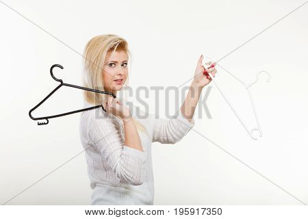 Blonde Woman Holding Clothes Hanger