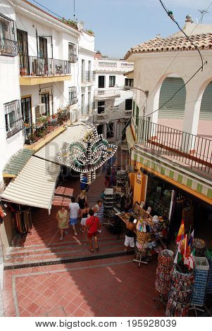 TORREMOLINOS, SPAIN - SEPTEMBER 3, 2008 - Elevated view of tourist shopping street in the old town Torremolinos Malaga Province Andalusia Spain Western Europe, September 3, 2008.
